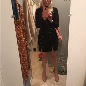 Black long-sleeved dress never worn.